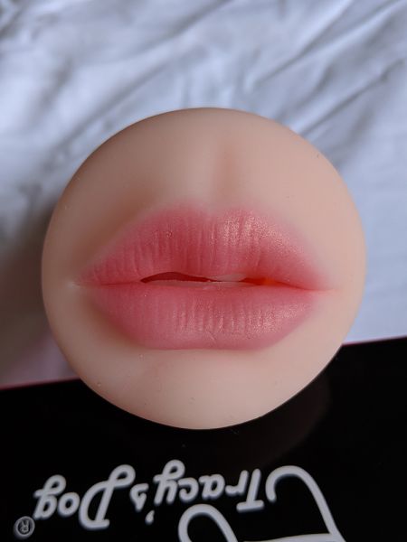 This toy is a Tracy's Dog 'Blow Job Stroker'. The lips of the toy are normally the same flesh tone as the rest of the outside of the toy, but I have blushed them here so they are pink instead.
Keywords: tracysdog sextoy sextoys masturbator sleeve blowjobstroker oral mouth lips